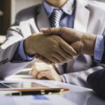 Handshake as successful negotiation ending, Business partnership meeting concept. Image businessmans