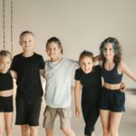 Portrait of a group of children in the fitness room. Children's yoga